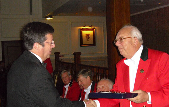 Captain of Breightmet receives Centenary Plate from EGU President